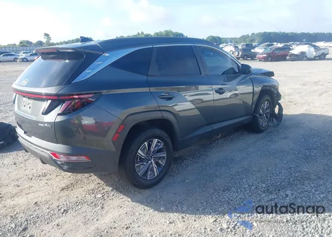 2022 Hyundai Tucson Blue from USA, damaged, VIN KM8JBCA15NU038973